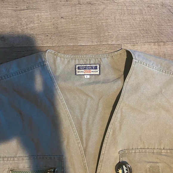 Brand New Green Utility Vest Size Large. - Picture 4 of 4